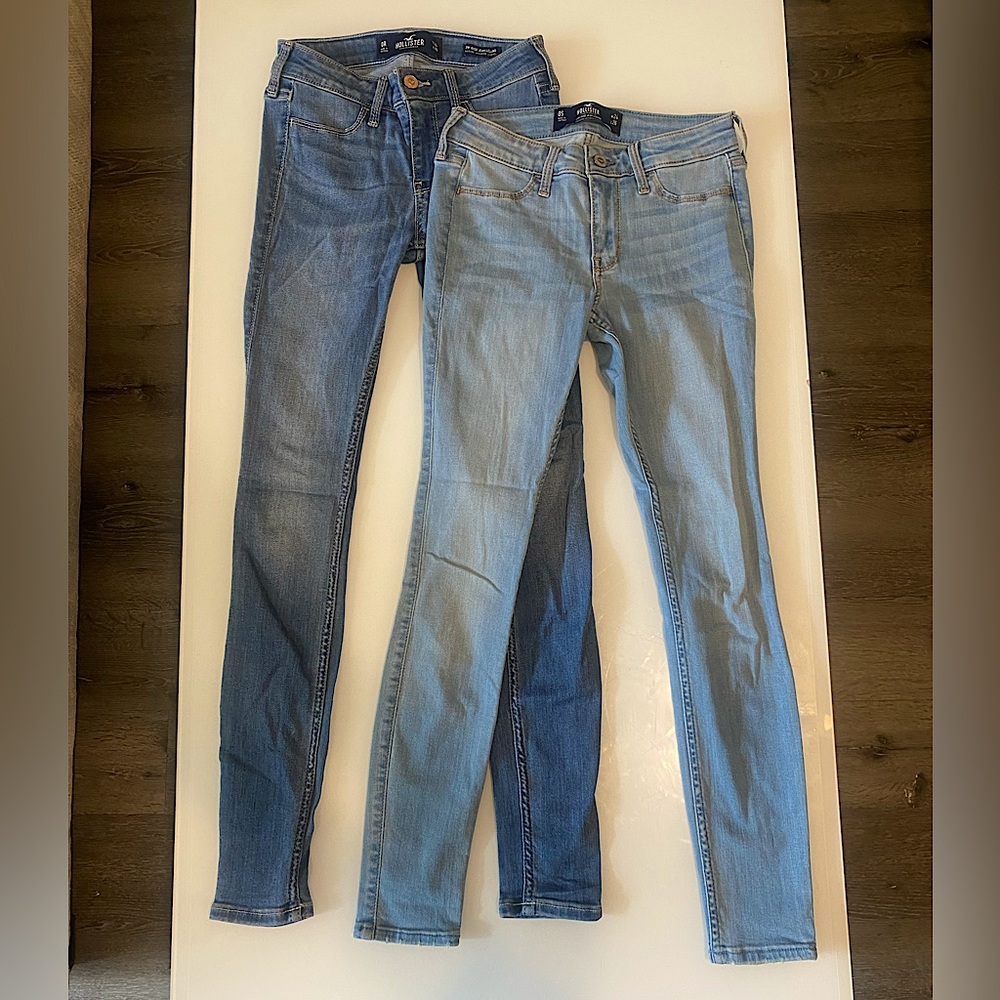 2 pairs of hollister jeans together